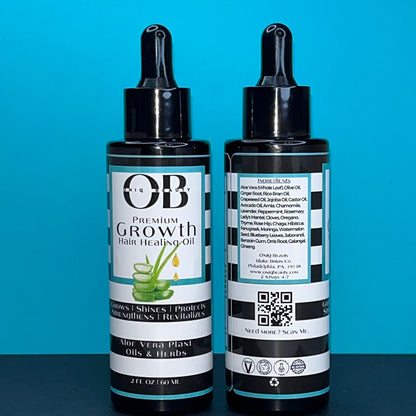 A black 2ml, 60 fl oz glass bottle of herbal hair growth oil. ONIQ Beauty Premium Growth Hair Healing Oil with Aloe Vera, Oils and Herbs. Vegan, Alcohol-free, Chemical-Free, Not tested on animals. The oil has Aloe Vera, oils and herbs.